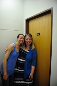 Former roommates Emily Waldon and Erica Huls stop by their first-year room in Urness.